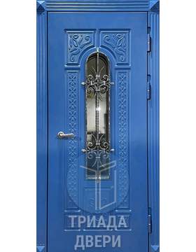 парадная металлическая дверь с коваными элементами