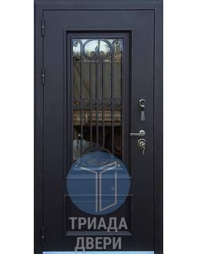 уличная металлическая дверь с коваными элементами